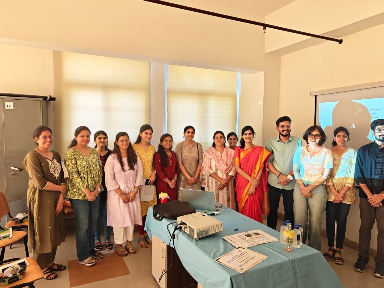 Dr. Neha Shukla presenting certificate — graduate 24
